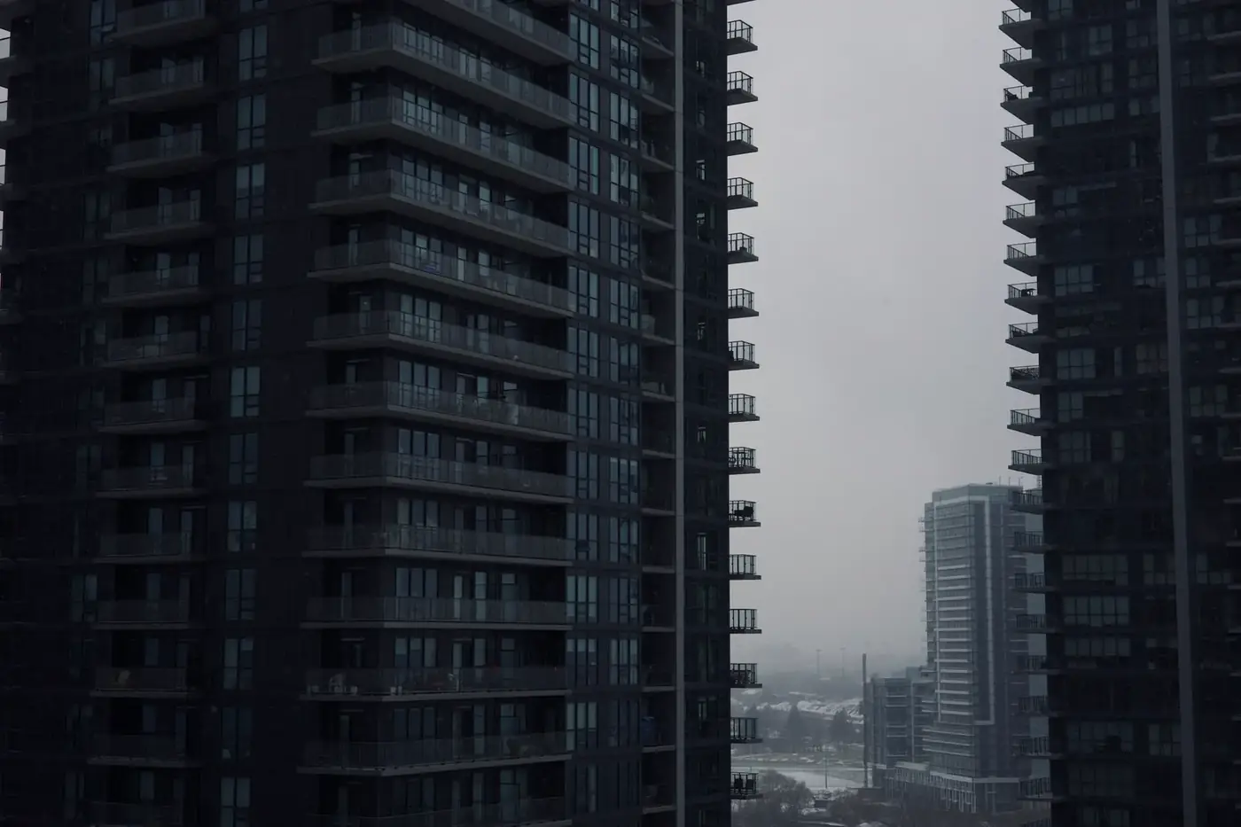 High-rise residential towers against an overcast sky